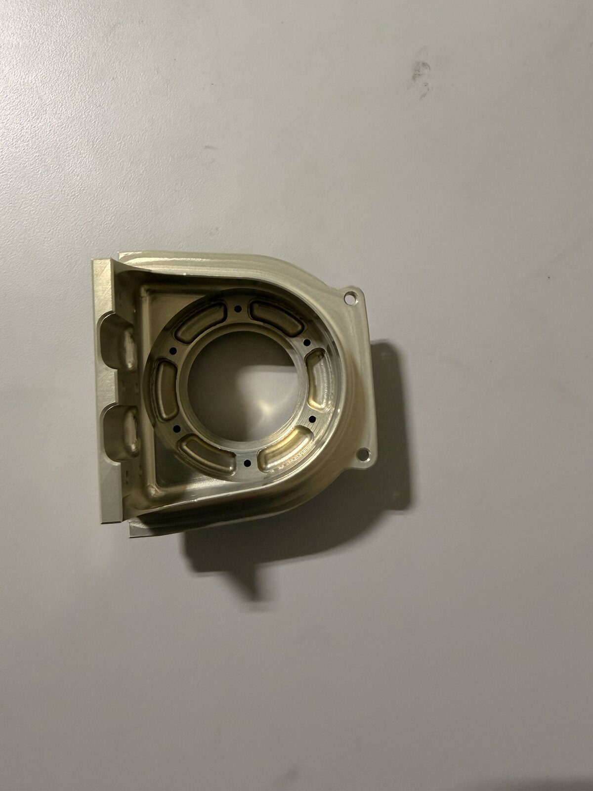 Precision-machined aluminum housing with a circular internal bore